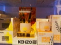 Restoring ice cream KenzoKi Creme Glacee Regenerante and Creme Surdouee Teint Frais Mine Radieuse Kenzo in cosmetics store on