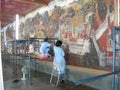 Restoring the mural at the Grand Palace.