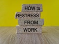 Restress from work symbol. Concept words How to restress from work on brick blocks