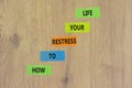 Restress your life symbol. Concept words How to restress your life on colored paper on a beautiful wooden table wooden background