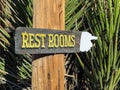 Restroom sign points the way Royalty Free Stock Photo