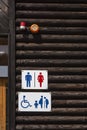 Restroom signs indicted rooms for male, female, wheel chair person, parents with kids and elderly.