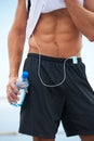 The result of a powerful workout. Cropped image of a muscular and physically fit mans torso after exercise.