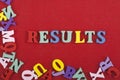 RESULTS word on red background composed from colorful abc alphabet block wooden letters, copy space for ad text. Learning english Royalty Free Stock Photo