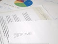 Resume sitting with several documents Royalty Free Stock Photo