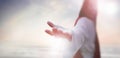 The resurrected Jesus Christ reaching out with open arms Royalty Free Stock Photo