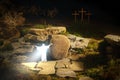 The resurrected Jesus, God, Christ, Messiah, Savior comes out of the grave during Resurrection Royalty Free Stock Photo