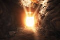 Resurrection. Entrance to a cave with light at the end Royalty Free Stock Photo