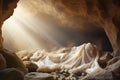 Resurrection of Jesus Christ, empty grave tomb with shroud, bible story of Easter, crucifixion at sunrise Royalty Free Stock Photo