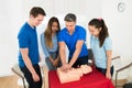 Resuscitation training using first-aid dummy Royalty Free Stock Photo