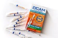 Retail box and several tubes of Zicam nasal swabs cold remedy. Copy space.