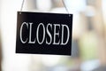 Retail, shop or store sign to show closed business in window, door or glass. Cafe, restaurant or coffee shop with poster Royalty Free Stock Photo