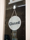 A retail shop window closed sign board. Royalty Free Stock Photo