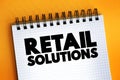 Retail Solutions text on notepad, business concept background Royalty Free Stock Photo