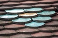 traditional terra cotta roof tiles texture with colorful ceramic tiles Royalty Free Stock Photo