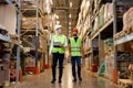 Retail Warehouse full of Shelves with Goods, Male Workers Supervisors Discuss Product Delivery