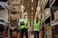 Retail Warehouse full of Shelves with Goods, Young Workers Supervisors Discuss Product Delivery