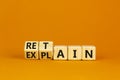 Retain or explain symbol. Turned wooden cubes and changed the word explain to retain. Beautiful orange background. Business,