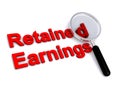 Retained earnings with magnifying glass on white Royalty Free Stock Photo