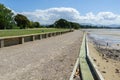 Retained walkway cycleway along water`s edge by golf course