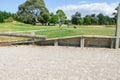 Retained walkway cycleway along water`s edge by golf course