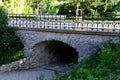 Retaining wall made of coarse basalt stones connected by cement. tunnel under the pedestrian road. the underpass is a historical r Royalty Free Stock Photo