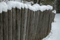 A retaining wall made of logs keeps the slopes from a landslide