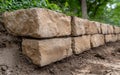 A retaining wall made of stone blocks. Royalty Free Stock Photo