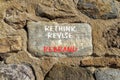 Rethink revise rebrand symbol. Concept word Rethink Revise and Rebrand on beautiful stone. Beautiful stone wall background.