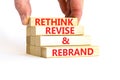 Rethink revise rebrand symbol. Concept word Rethink Revise and Rebrand on beautiful block. Beautiful white background. Business