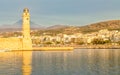 Rethymno, Greece island Crete, Peaceful landscape on the bay before sunset view of the lighthouse and the waterfront Royalty Free Stock Photo