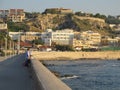 Rethymno, Greece - june 15, 2017: older men fishermen fishing by the sea at sunset