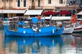 Rethymno, Greece, September 30 2018 View of the port with its boats, its shops and its tourists