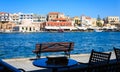 Rethymnon, Crete, Greece - August 15, 2015: bench overlooking the port of Rethymnon