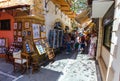 Rethymnon, Island Crete, Greece, - July 1, 2016: People and tourists walking on the narrow street of Rethymnon part of Old Town