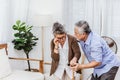 Retired Asian senior elderly wife pain from heart attack disease Royalty Free Stock Photo
