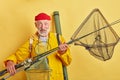 Retired bearded crazy old man going fishing alone Royalty Free Stock Photo