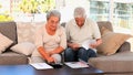 Retired couple calculating their domestics bills