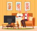 Retired couple with gamepads play on console. Old people spend time with video games at home