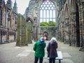 Retired couple visit the ruins of the castle - sightseeing in scotland