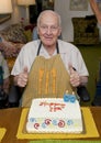 Retired family physician celebrating his 88th birthday in his home with his family.