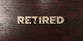 Retired - grungy wooden headline on Maple - 3D rendered royalty free stock image