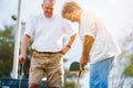 Retired lifestyle of senior couple playing mini golf