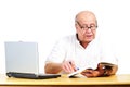 Retired man with a laptop