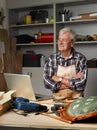 Retired man with laptop Royalty Free Stock Photo