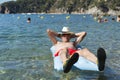 Retired man playing in sea water Royalty Free Stock Photo