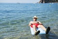 Retired man playing in sea water Royalty Free Stock Photo