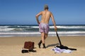 Retired senior man undressed on a caribbean beach, retirement freedom concept Royalty Free Stock Photo