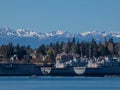 Old Navy ships in front of town and Hurricane Ridge Royalty Free Stock Photo