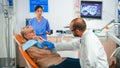 Retired woman having symptoms of gums pain Royalty Free Stock Photo